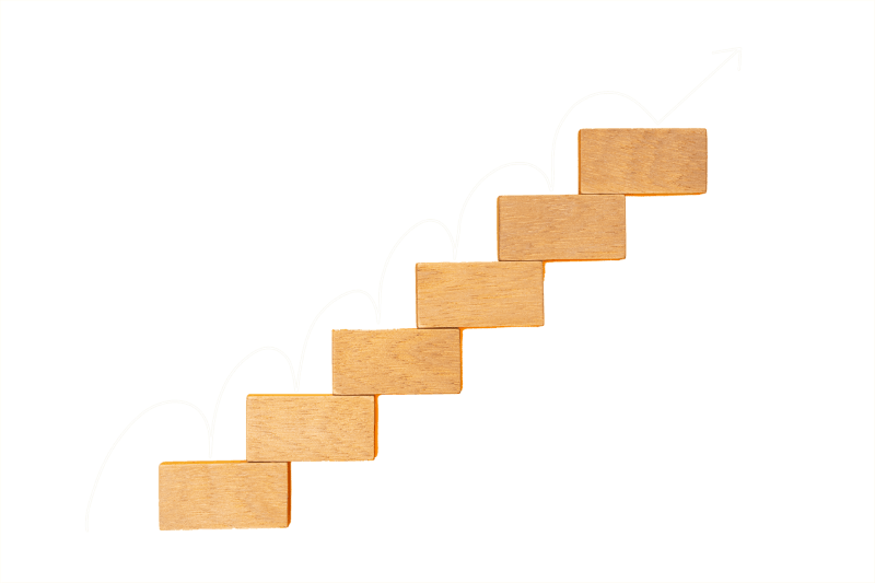rising-arrow-on-wooden-staircase-2023-11-27-05-00-49-utc-min